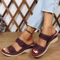 Side view of women's purple wedge sandals with 3D floral accents and rhinestones - 36 / Dark Brown