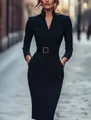Elegant black long-sleeved dress with gold buckle belt and pockets for professional workwear - S / Dresses / Black