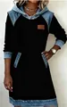 Detailed view of a women's black hooded dress with stylish blue denim patchwork design. - 4XL / Dresses / Black