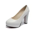 Detailed close-up view of white patent leather platform pumps with chunky high heels - 34 / White