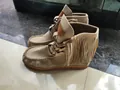 Detailed view of beige fringe ankle boots with laces and thick gum soles for women - Khaki