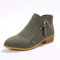 Detailed side view of women's pointed-toe ankle boots with chunky heel and side zipper - Green