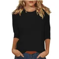 Close-up of a women's minimalist solid black crew neck T-shirt with 3/4 sleeves - S / Tops / Black