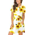 Detailansicht eines sommerlichen Damenkleids mit Sonnenblumenprint und Seitentaschen - S / Kleider / Gelb