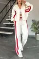 Fashionable white Y2K women's tracksuit set featuring bold red side stripe details - S / Top And Bottom / White