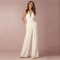 Elegant white sleeveless halter neck wide leg jumpsuit with a deep V-neck style - S / White