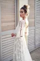 Elegant white lace evening dress featuring a deep V-neck and an exquisite backless design - S / Dresses / White