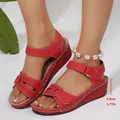 Red wedge sandals for women featuring 4.5cm heel height and adjustable ankle strap - 38 / Red