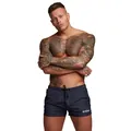 Detailed front view of navy blue men's athletic beach shorts on a muscular model - M / Bottoms / Navy Blue