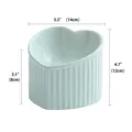 Heart-shaped ceramic pet bowl in light blue with slanted mouth and vertical ribbing - Slanted Bowl / Light Green