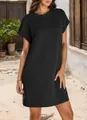 Detail shot of a casual black short-sleeve dress featuring round neck and rolled cuffs. - S / Dresses / Black
