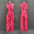 Detailed front and back views of a elegant pink floral pleated sleeveless jumpsuit - S / Pink
