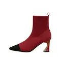 Elegant red and black pointed toe knit sock boot with a unique sculpted heel design. - 38 / Red