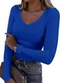 Close-up of blue ribbed texture and V-neckline on this slim fit long sleeve women's top. - S / Tops / Blue