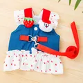 Detail of denim pet harness dress featuring cartoon bear, strawberry and red leash. - XS / With Leash / Dark Denim White Heart
