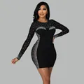 Full-body view of a black bodycon mini dress with rhinestones and sheer mesh panels. - S / Dresses / Black