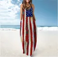 Casual women's summer maxi dress featuring an American flag print and halter neck on a beach - Watermelon red