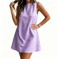 Close-up detail of a women's summer sleeveless round neck dress with purple gingham pattern - Purple