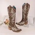 Close-up of brown tall boots with elegant white floral embroidery and chunky heel - 35 / Coffee