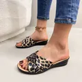 Detail shot of stylish leopard print wedge sandals for women with an open-toe design. - 38 / Pleated Cross Peep Toe Style / Leopard Brown