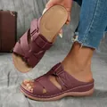 Close-up detail of women's burgundy wedge sandals featuring hollow-out design and thick sole - 36 / Burgundy