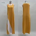 Vue avant et arrière d'une robe maxi sans manches jaune avec poches contrastées. - S / Jaune