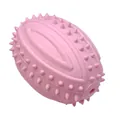Pink spiked rugby dog chew toy made of durable TPR rubber for puppy teething and play - Macaron Pink