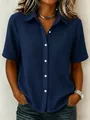 Close-up of a women's navy blue cotton button-up shirt showing crinkle texture - 3XL / Tops / Dark Blue