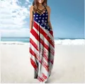 Full-length detail of a summer maxi dress with American flag print at a sunny beach - S / Dresses / Blue
