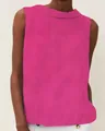 Detail shot of a vibrant pink cotton linen sleeveless top featuring a sleek boat neckline - Rose Red