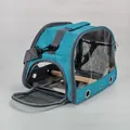 Blue portable bird carrier bag with wooden perch and interior metal tray detail view - Includes Perch And Steel Tray / Sky Blue