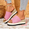 Close-up detail of pink linen wedge slippers showing the 2.75 inch platform heel. - 36 / Pink