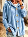 Vista dettagliata di un cardigan con cappuccio in velluto blu e bottoni in legno. - Taglia S / Top / Celeste
