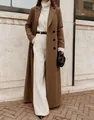 Elegant long brown wool coat styled with a white turtleneck and trousers for winter. - Khaki