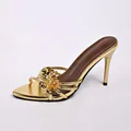 Elegant gold metallic high-heel mule featuring a stunning decorative floral accent - 35 / Gold Flower