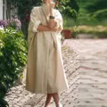 Elegant light apricot oversized trench coat with large lapels and double buttons - S / Tops / Beige