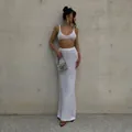 Close-up of white knit two-piece set with crop top and high-waisted maxi skirt - S / Top And Bottom / White
