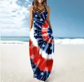Sleeveless summer maxi dress with tie-dye patterns and star prints in a beach setting. - S / Dresses / Light Blue