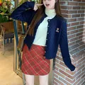 Navy blue cable knit cardigan featuring bear embroidery in a Korean preppy style outfit. - One Size / Tops / Navy Blue