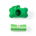 Green bone-shaped pet waste bag dispenser with a refill roll on white background - With Garbage Bags / Green