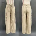 Front and back detail view of women's khaki wide-leg cargo pants with utility pockets - Khaki