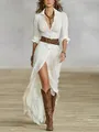 Detailed view of white long-sleeved shirt dress with front slit and waist belt. - S / Dresses / White