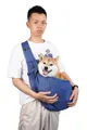 Detailed view of breathable blue pet sling bag worn by model with Shiba Inu - Pets Within 7.5kg / Sapphire Blue