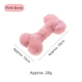 Soft pink plush bone-shaped dog toy featuring a cute heart embroidery detail, 18cm length - Pink Bone