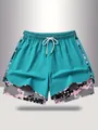 Teal double-layered women's sports shorts with digital camo inner and drawstring - Emerald