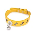 Adjustable yellow leather pet collar featuring bone cutouts and a silver bell charm - One Size: Neck 22-32cm / Yellow