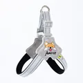 Detailed view of a grey reflective dog harness featuring a cute cartoon dog logo - S / Harness (Random Pattern) / Black