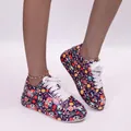Fashionable graffiti print sneakers for women featuring skull and floral pattern designs - 38 / Skull and Floral Graffiti / Purple