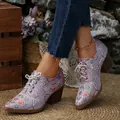 Close-up of vintage embroidered satin lace-up chunky high heels with pointed toe. - US Size 7.5 / Purple