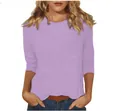 Close-up detail of women's lilac crew neck T-shirt featuring elegant 3/4 sleeves. - S / Tops / Light Purple